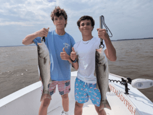 Matt and Alex Catching Stripers