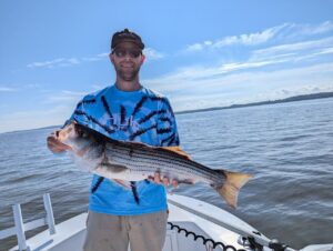 Kyle caught this nice striped bass floating an eel.